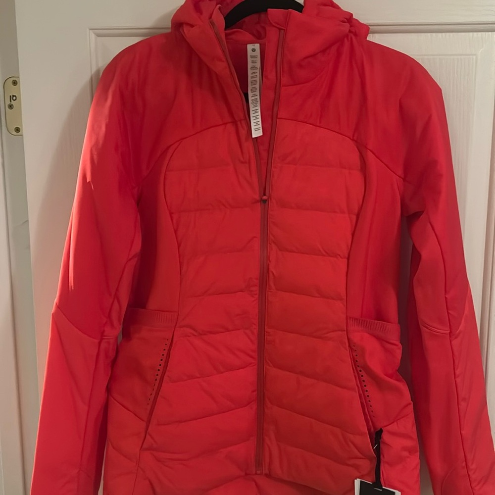 New with tags LULULEMON light weight down jacket.